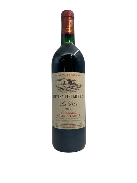 Bottle of La Pitié Bordeaux red wine from Chateau du Moulin 1990