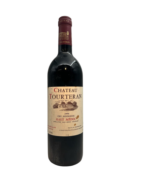 Flaska Haut Médoc Chateau Tourteran rött vin 1996